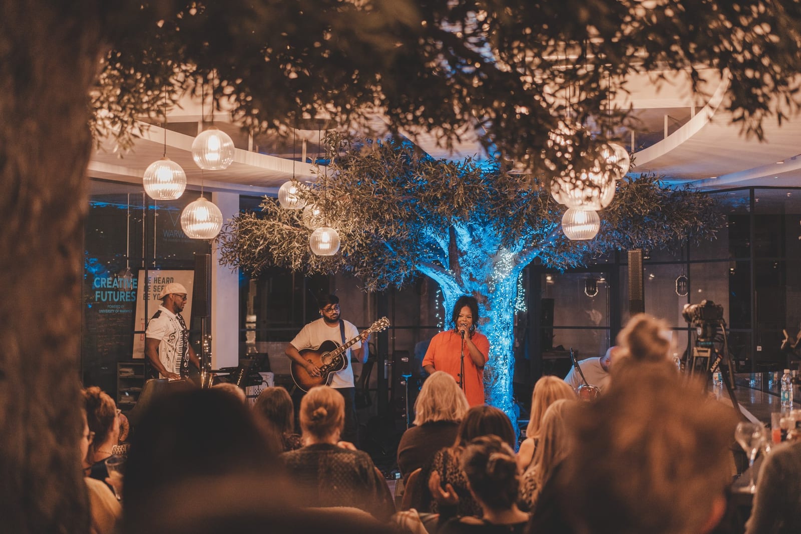 Live music under the tree at 1 Mill Street