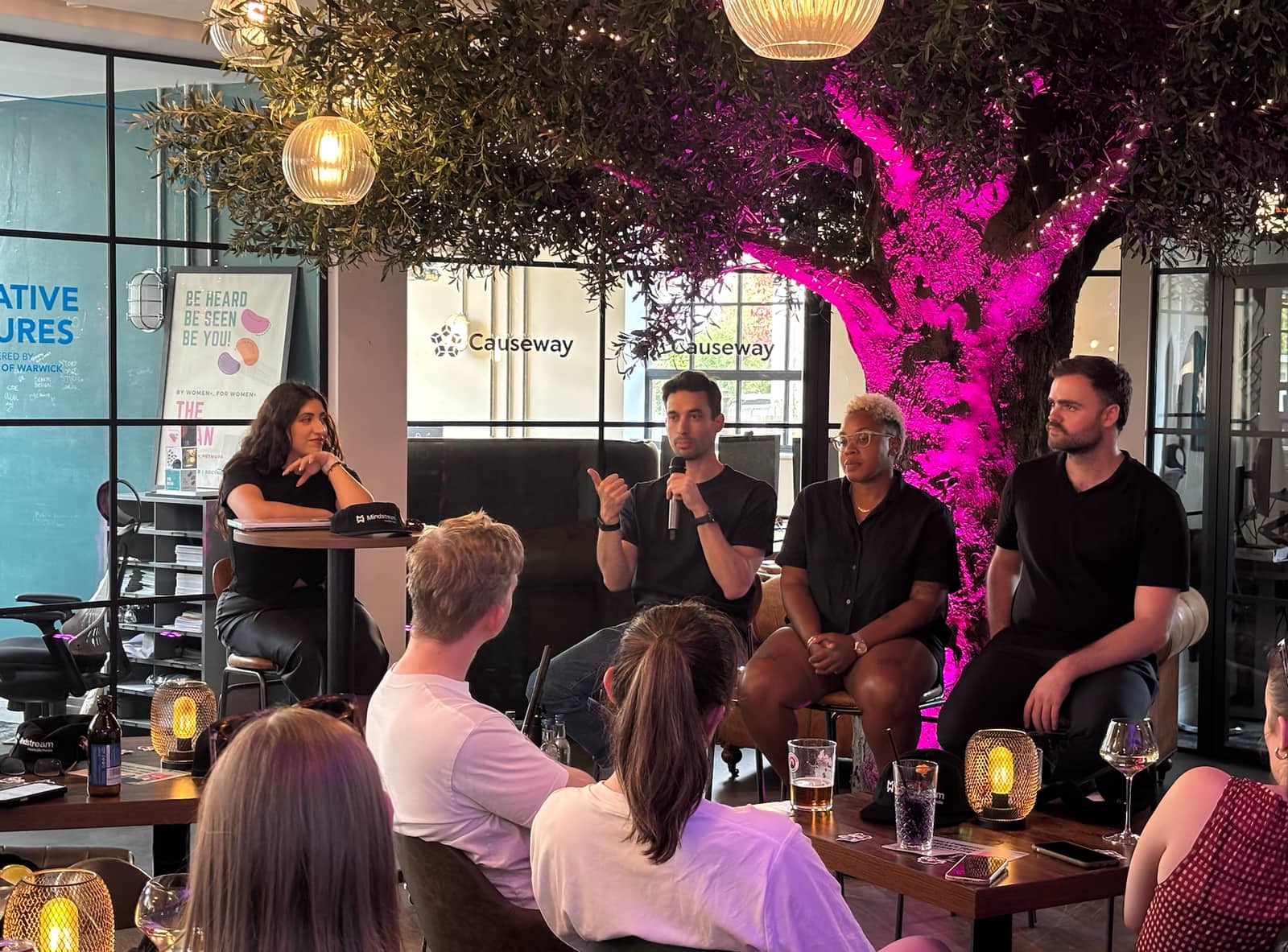 A panel talk under the tree at 1 Mill Street