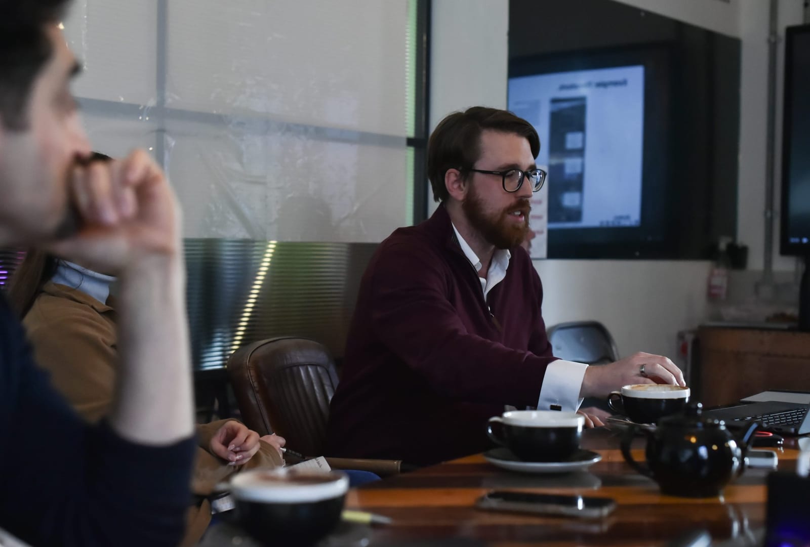 Two members in a meeting at 1 Mill Street