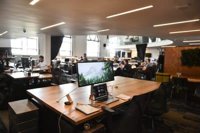 A desk with a monitor in a private serviced office at 1 Mill Street, Leamington Spa